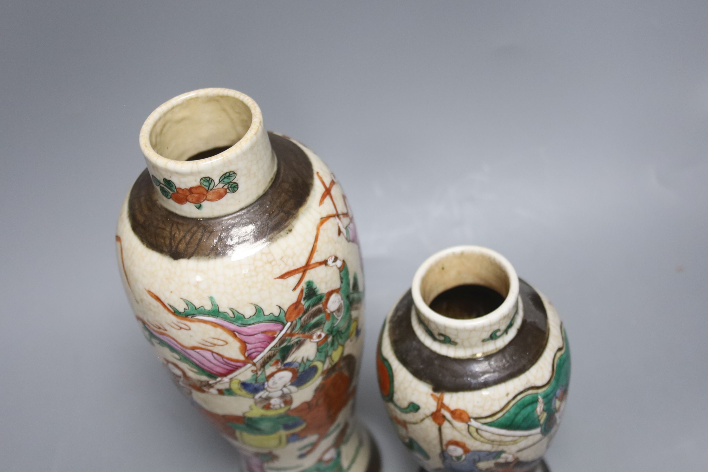 Three early 20th century Chinese crackle glaze vases, two with covers, tallest 33.5cm